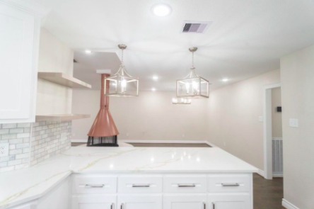 Workspace with notebook and laptop